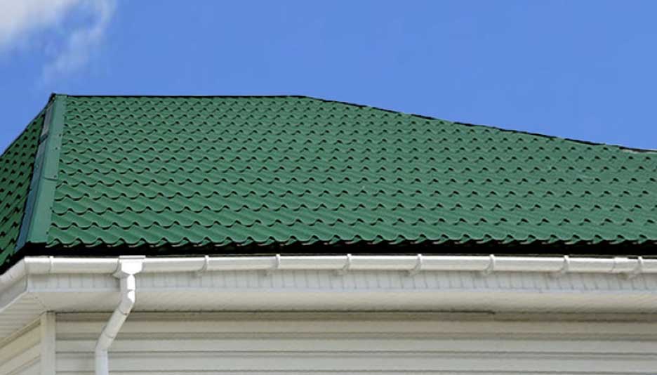Simulated clay tile metal roofing on an Arizona building